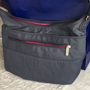 Travelon RFID shoulder or crossbody hobo bag.